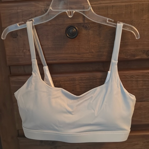 Other - Sports bra. Never worn. Size: medium.Color: Bluish grey.